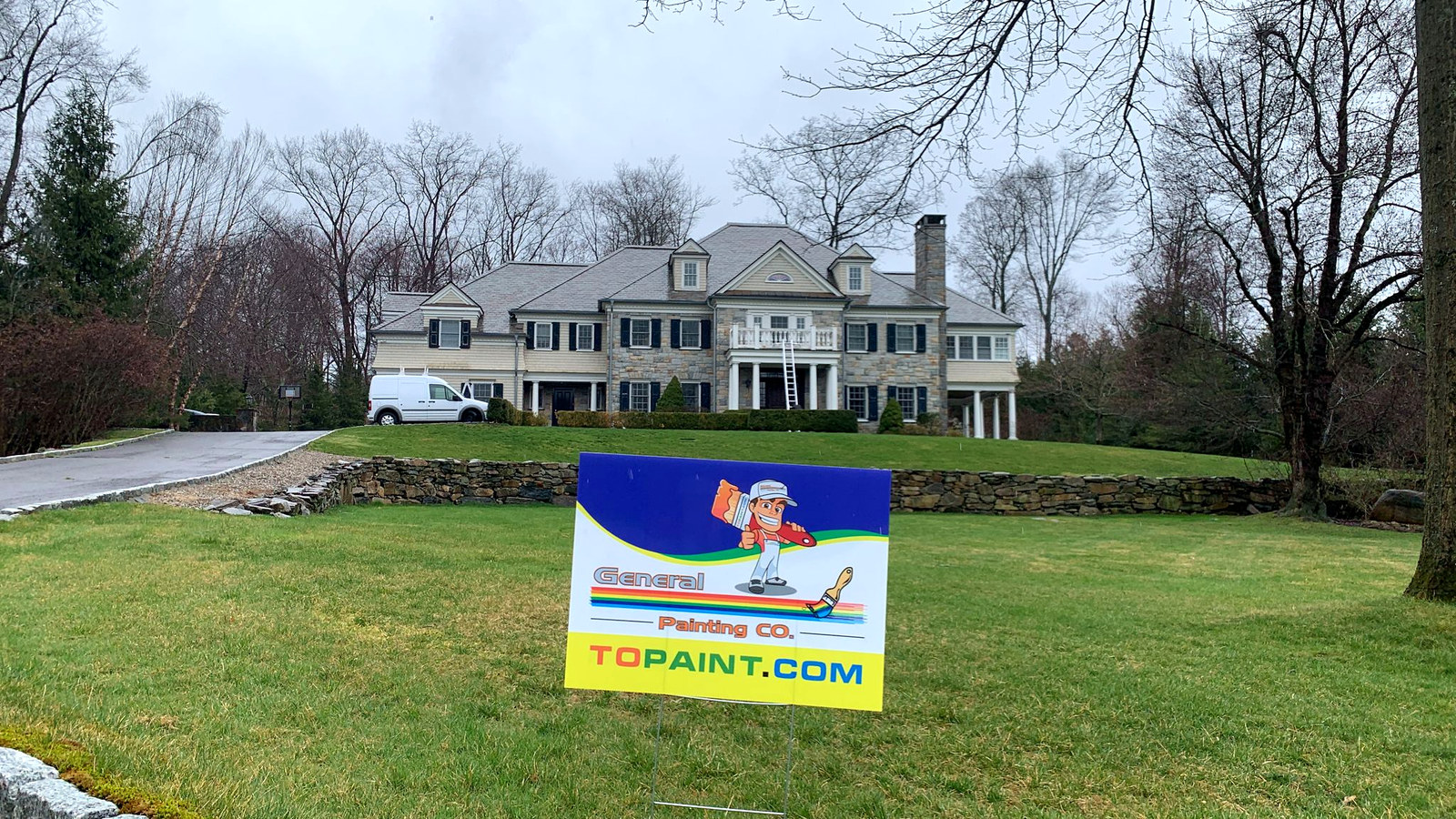 Stone and shingle estate home in Fairfield County CT recently repainted