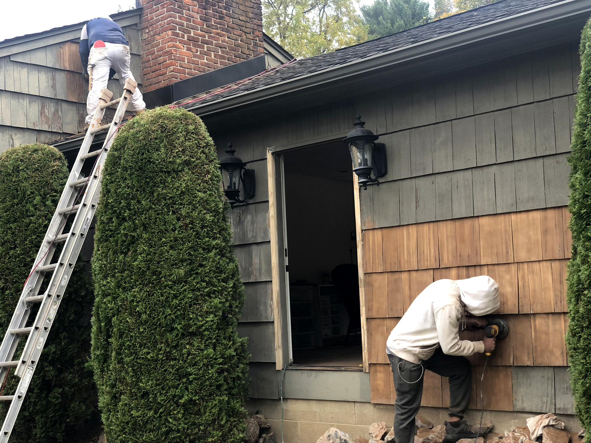 Cedar shake siding wood-rot repair on weathered Connecticut home